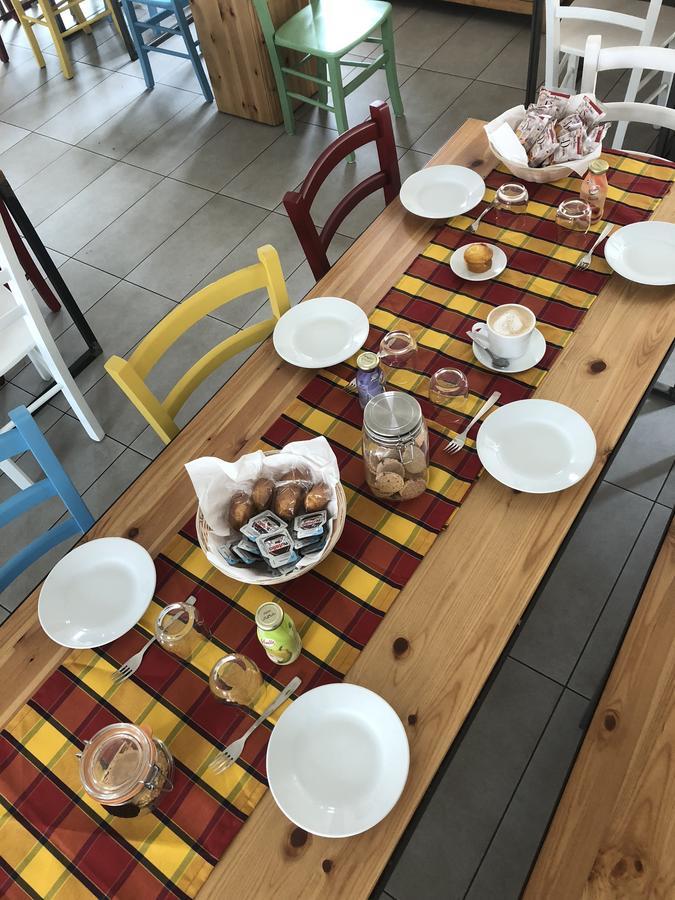 Cascina Monte Diviso Hostel กัลลาราเต ภายนอก รูปภาพ